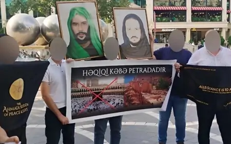 Təriqət üzvləri Bakının mərkəzində plakat açdılar