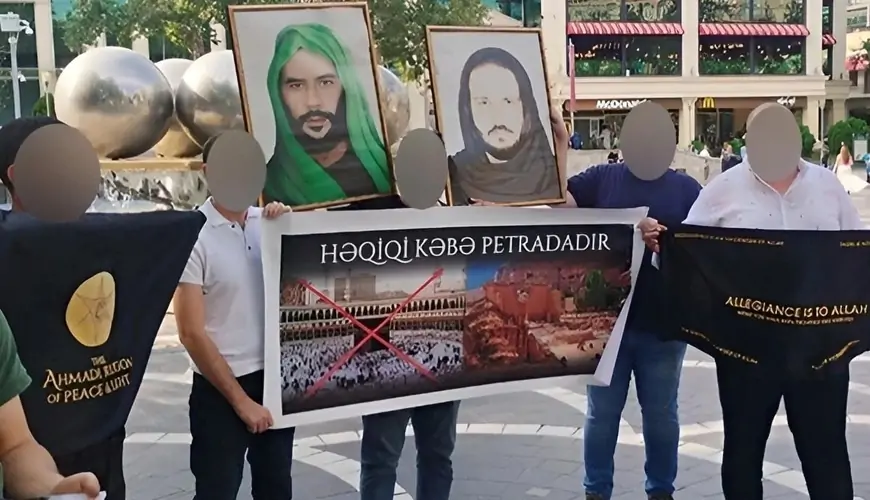 Təriqət üzvləri Bakının mərkəzində plakat açdılar - Saxlanılanlar var