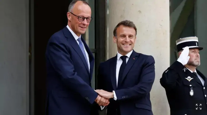 Makron onu sevinclə qarşıladı 